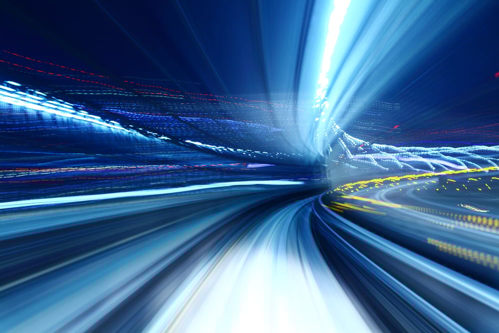 Light trail of train in tunnel