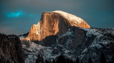 Rocky outcrop in Yosemite silhouetted against the evening sky